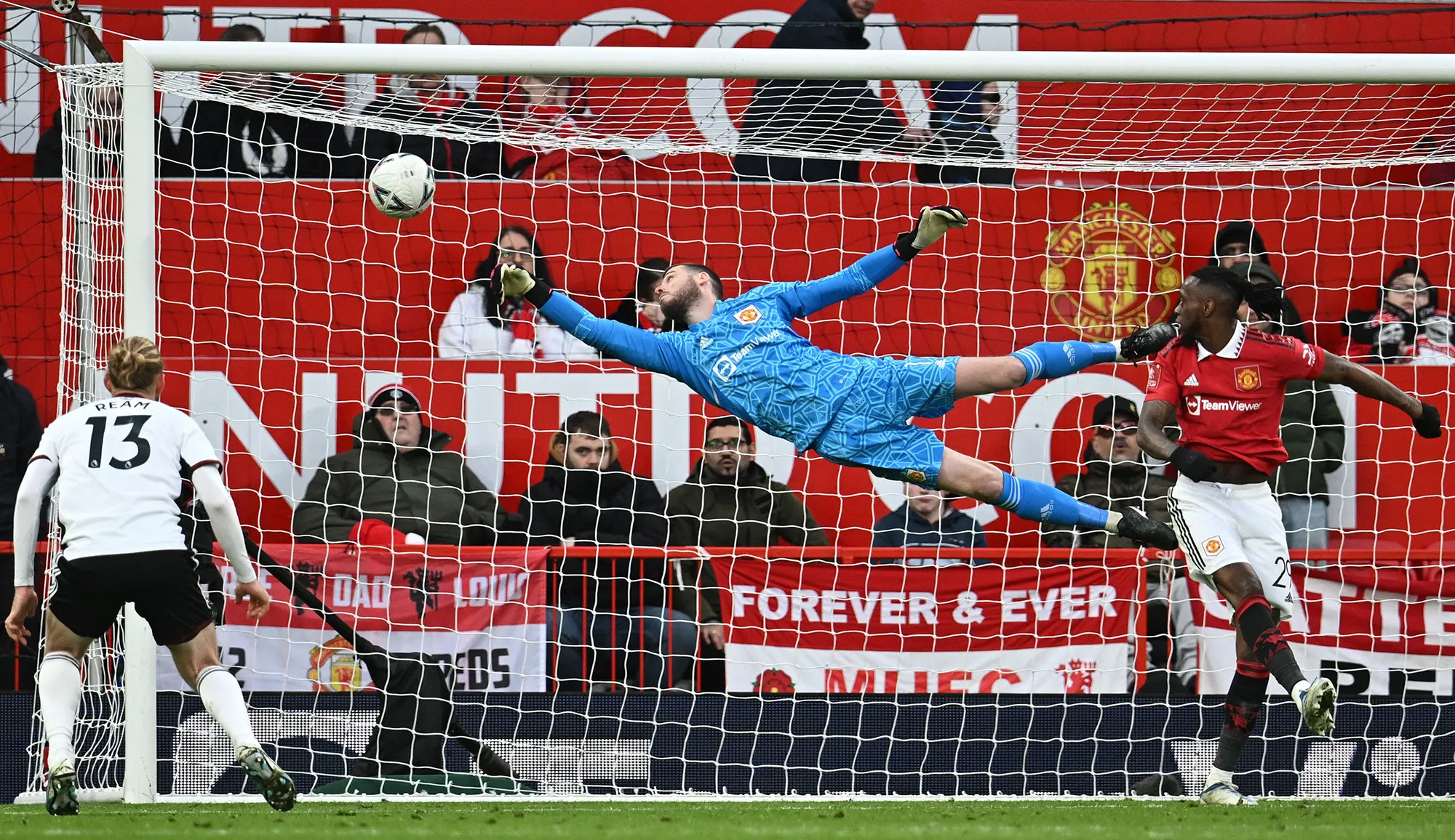 Manchester United's goalkeeper David de Gea saves a headed shot.