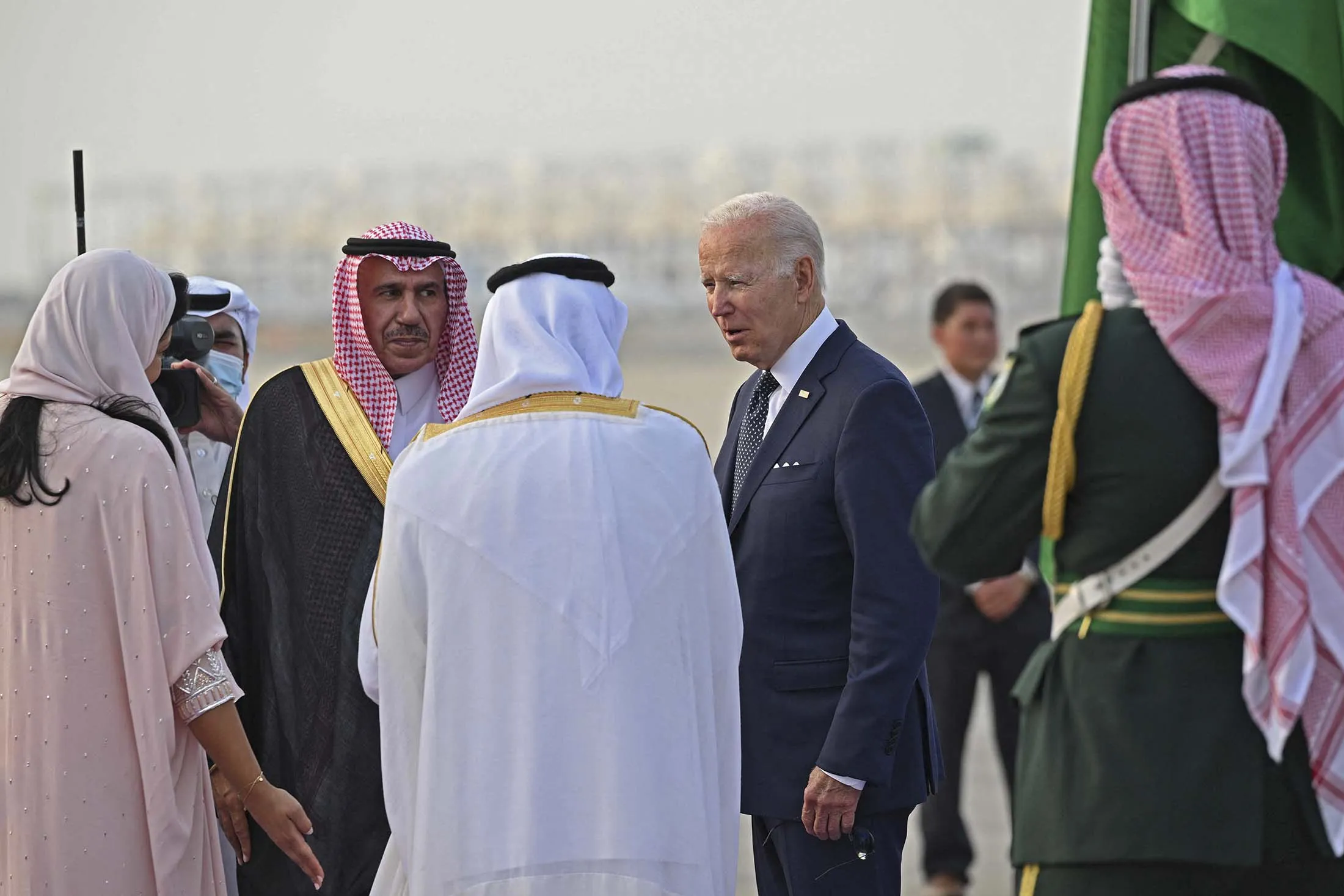 President Joe Biden, center,&nbsp;is welcomed at the King Abdulaziz International Airport in Jeddah, Saudi Arabia, on July 15.