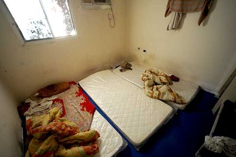 The bedroom of workers' accommodation in the Industrial Area of Doha