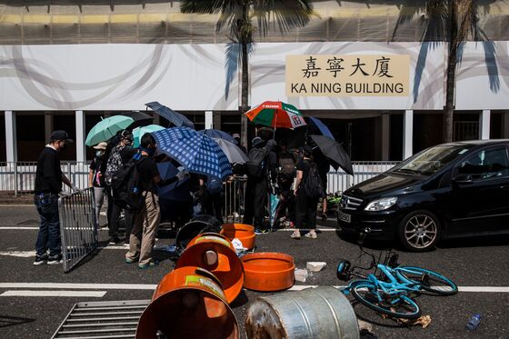 Protester Shot in H.K. on China’s National Day: Hong Kong Update