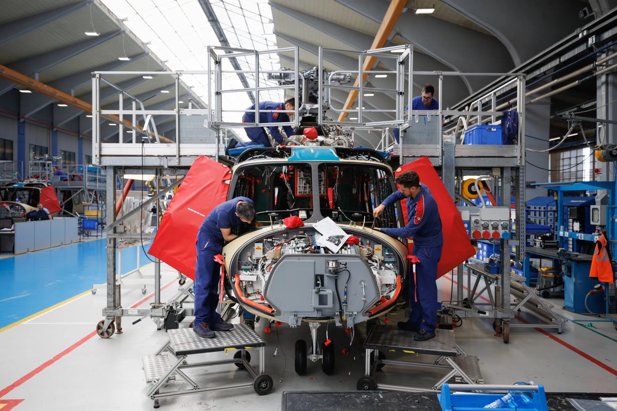 Workers assemble a Leonardo AW139 helicopter on the production floor at the Leonardo SpA factory in Varese.