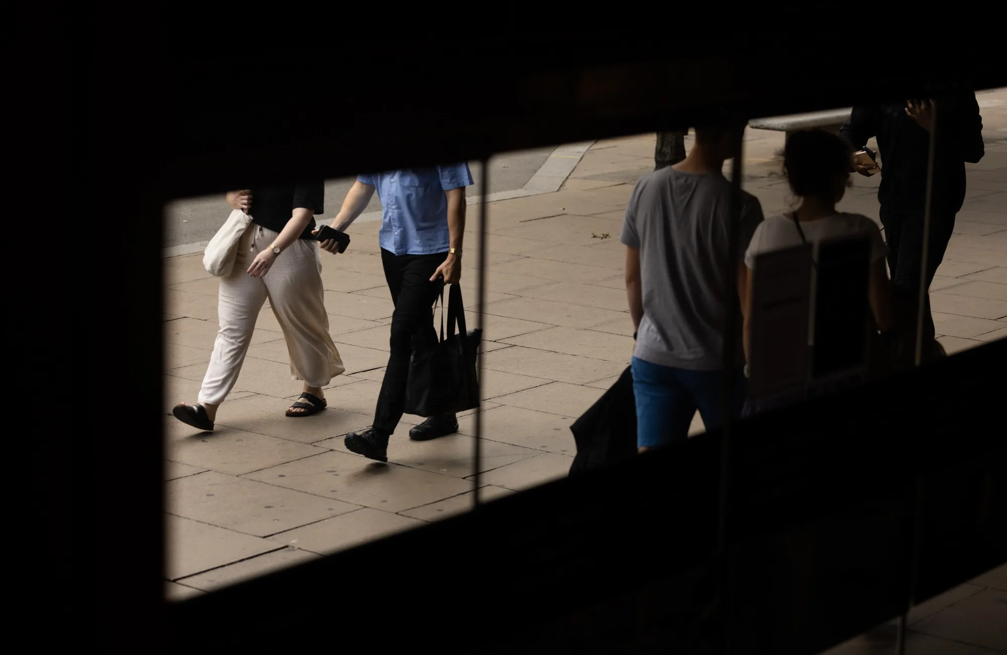 Consumers are once again donning summer dresses and sandals rather than splashing out on expensive overcoats, knitwear and boots.