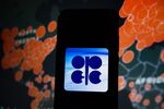 In this photo illustration an OPEC logo seen displayed on a
