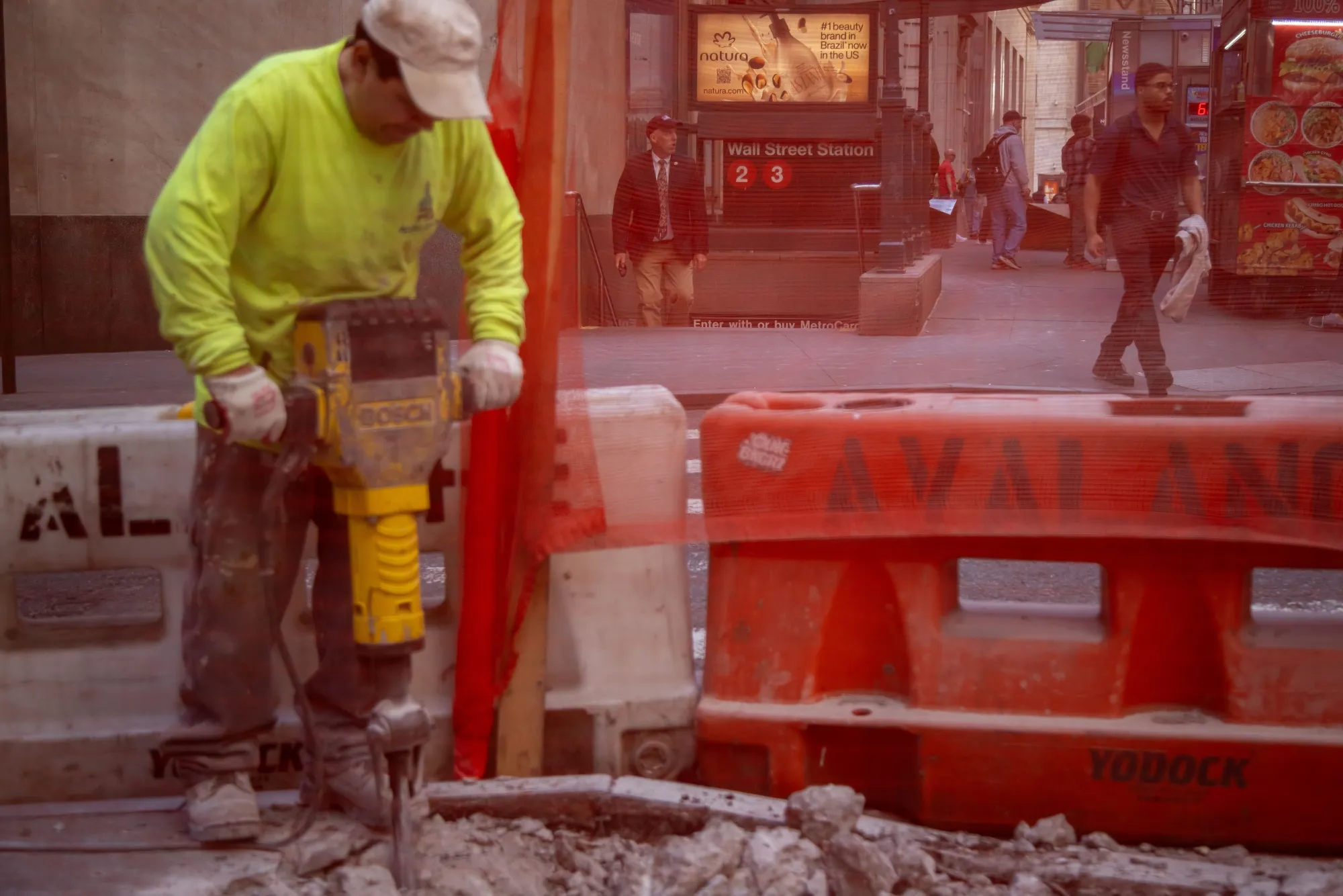 Road work on Wall Street near the New York Stock Exchange.