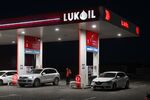 Vehicles at a Lukoil PJSC petrol station in Belgrade, Serbia, on Wednesday, Oct. 29, 2025. Russia’s second-largest oil producer, Lukoil announced plans to sell international assets after being hit by US sanctions last week.