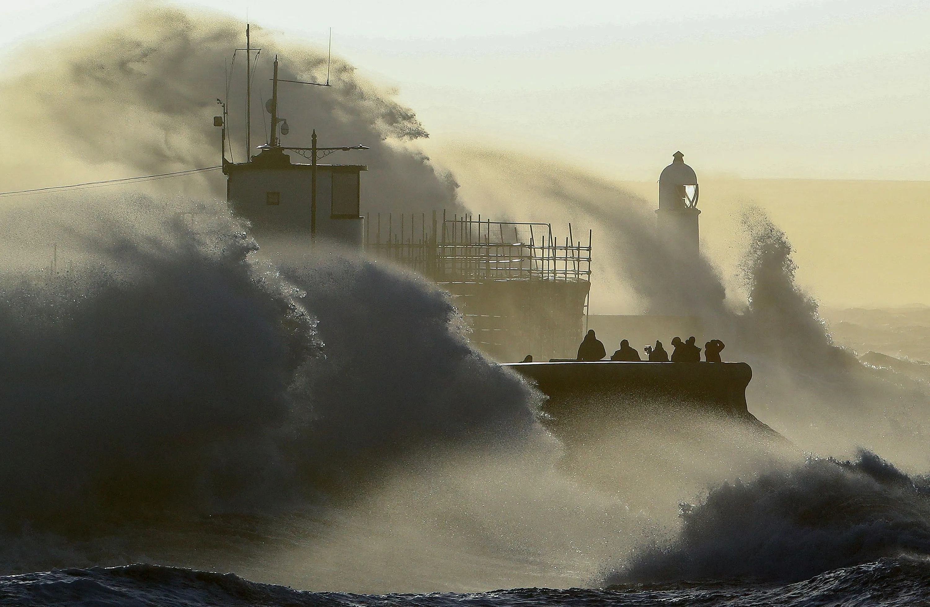 Waves crash against the sea wall at Porthcawl, south Wales, U.K., on Feb. 18.