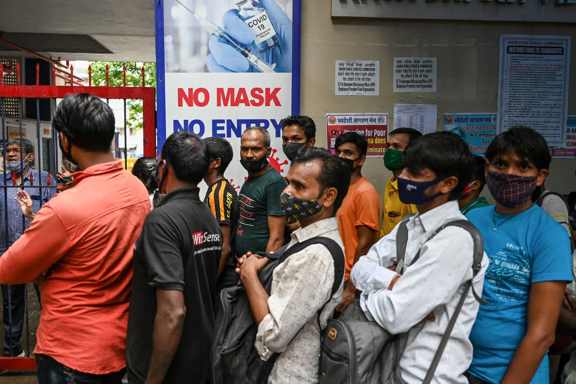 People queue up get inoculated&nbsp;against the Covid-19 coronavirus, at a temporary vaccination centre&nbsp;in Mumbai .