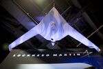 A Lockheed Martin Corp. Fury unmanned aircraft system (UAS) hangs above the exhibition floor at the Association for Unmanned Vehicle Systems International (AUVSI) unmanned systems conference in Washington, D.C., U.S., on Tuesday, Aug. 13, 2013.&nbsp;