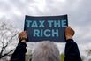 Demonstrators Protest Tax Breaks For Billionaires And Corporations At US Capitol