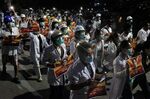 Medical staff and students take part in a protest against the military coup in Mandalay, March 21.