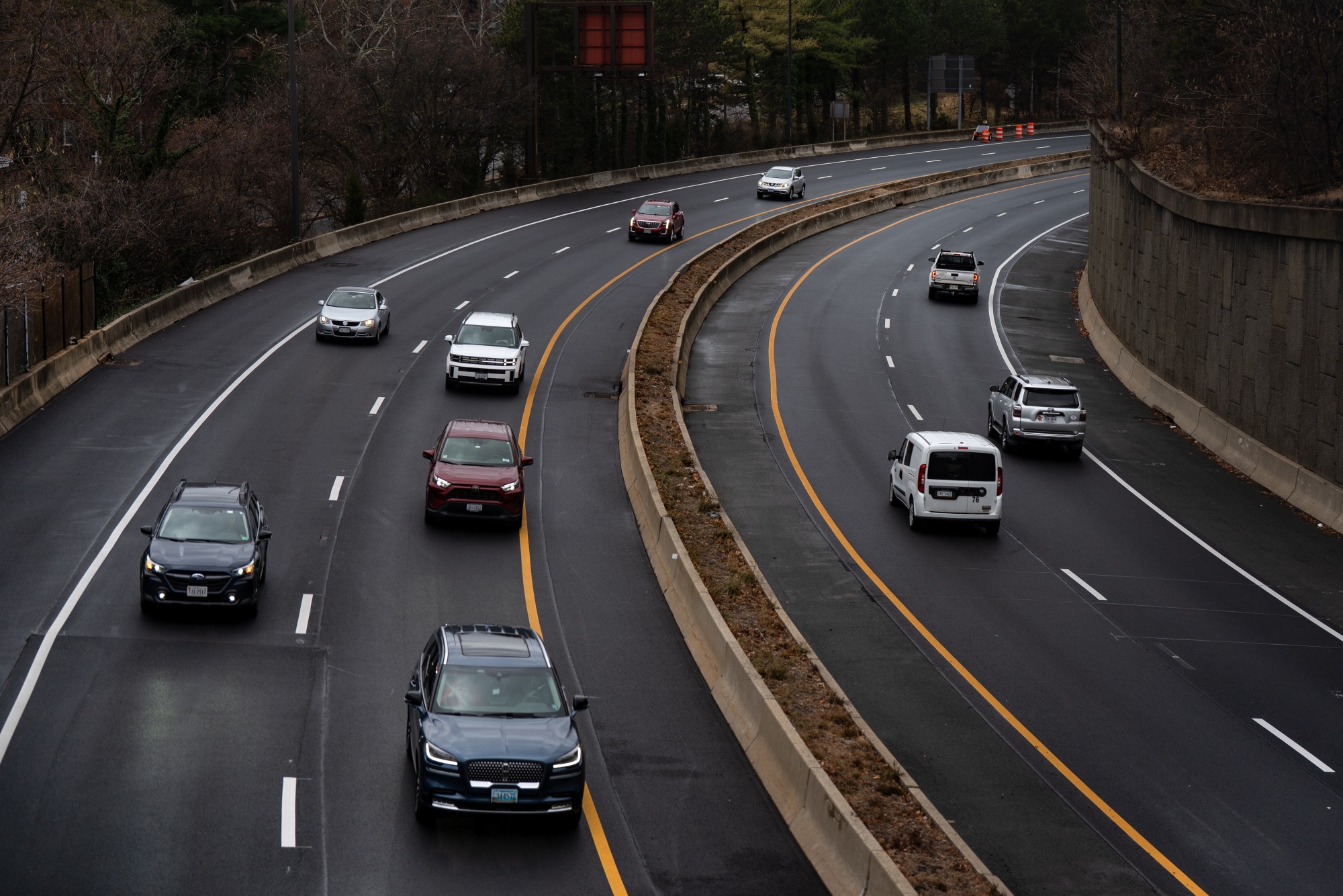 Traffic on Curtis Memorial Parkway (Interstate 66) in Arlington, VA, US, on Tuesday, Dec. 23, 2025. A record number of Americans are expected to hit the road over the December holiday period as gas prices slide to lows not seen since the pandemic. Photographer: Kent Nishimura/Bloomberg