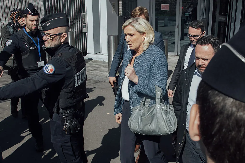 Marine Le Pen, leader of National Rally, leaves a court in Paris&nbsp;on Monday.