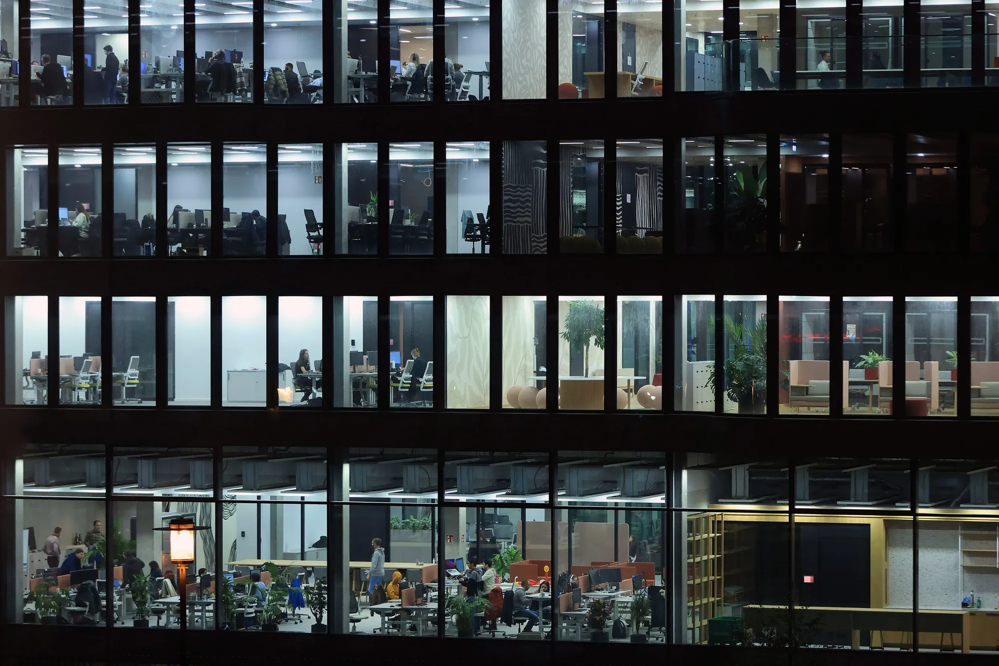 Lights on at an office building in Berlin.