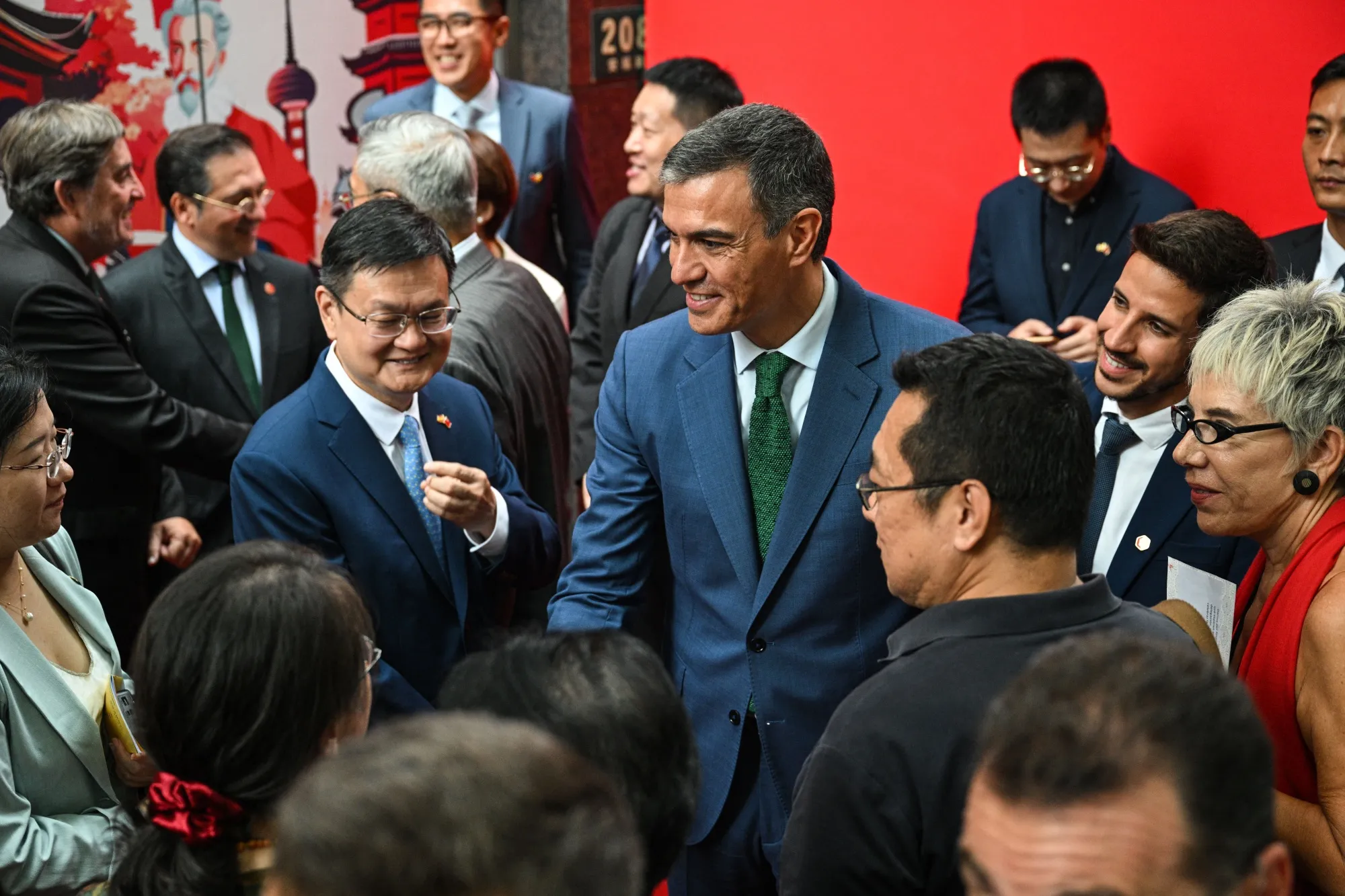 Pedro Sanchez, center, in Shanghai on Sept. 10.