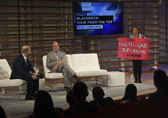 Larry Fink Confronted by Anti-Gun Protesters at Yahoo Summit