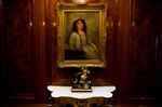 A painting hangs on a wall inside a yacht on display during the Yachts Miami Beach Boat Show. 