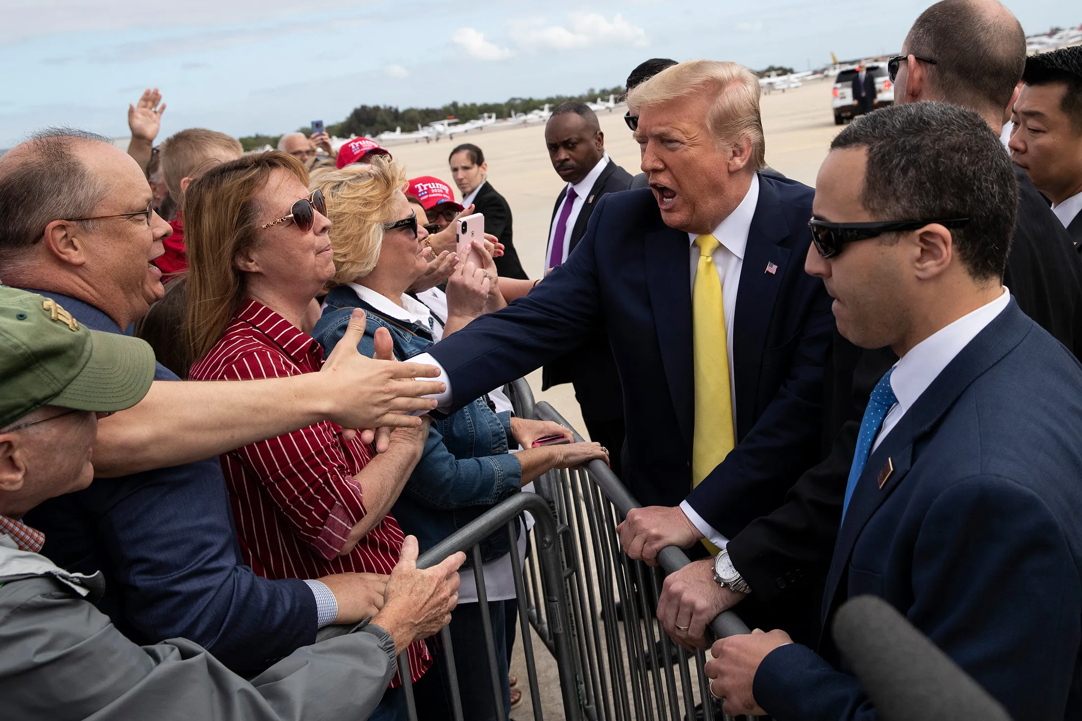 Donald Trump shakes hands with supporters in Orlando, Florida on March 9.