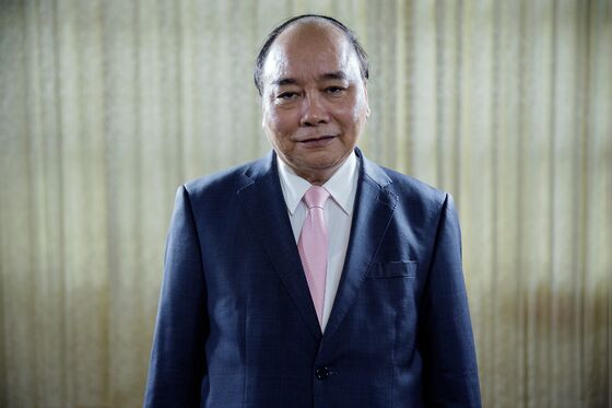 Vietnam’s Premier Seeks ‘New Ways’ to Survive U.S.-China Trade War