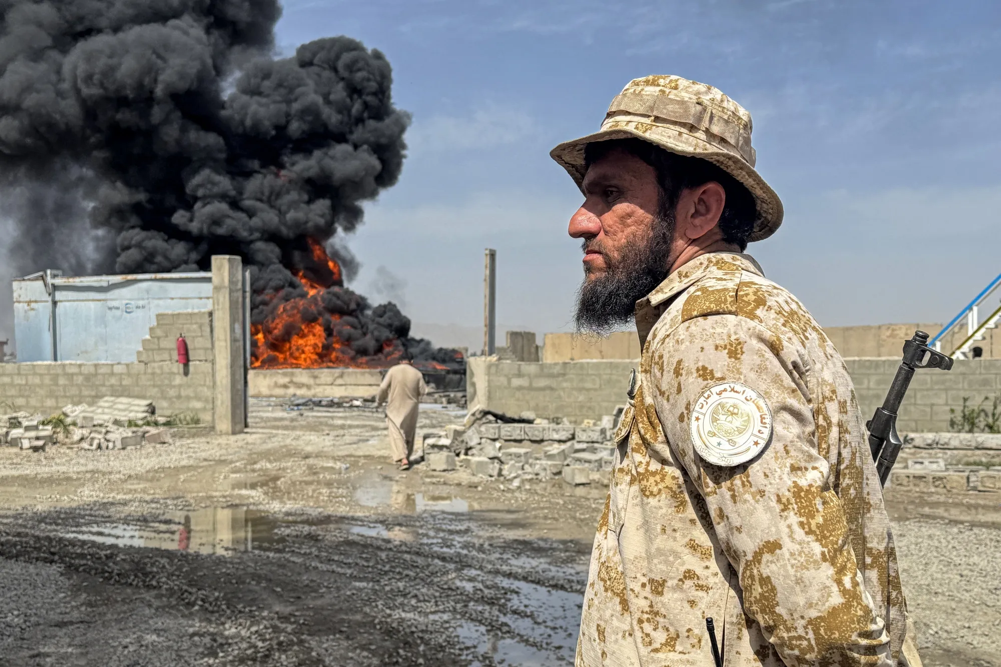 Smoke rises from the site of Pakistani airstrikes near the Kandahar airport in Afghanistan on March 13.