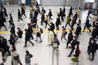 Commuters In Tokyo As Japan Encourages Employees To Work From Home