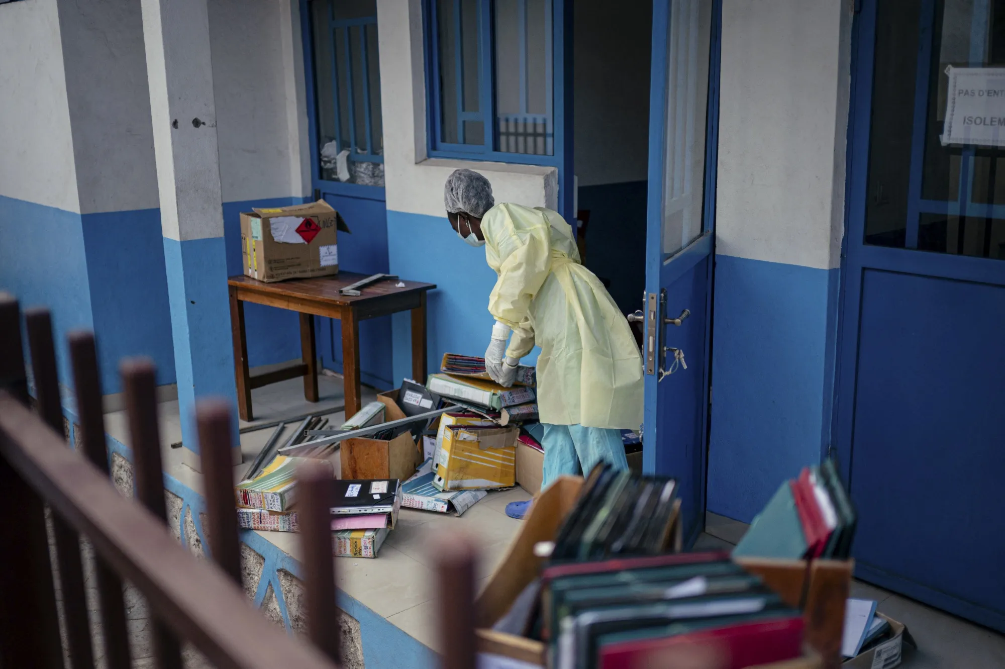 Staff members at CBCA Virunga Hospital prepare rooms intended for possible suspected Ebola cases in Goma, on May 17.