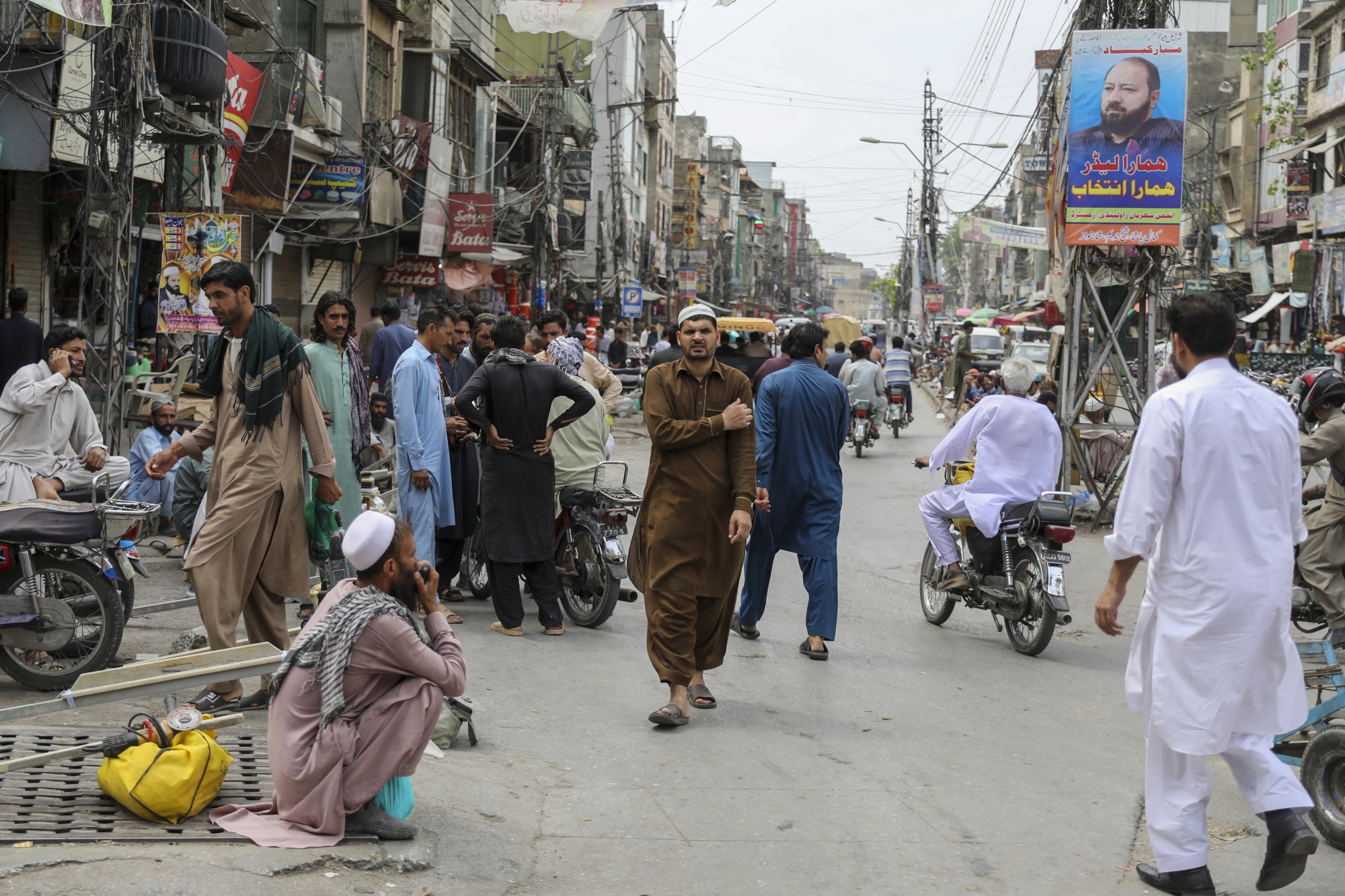 Day laborers wait for work in Rawalpindi, Pakistan, on May 30.
