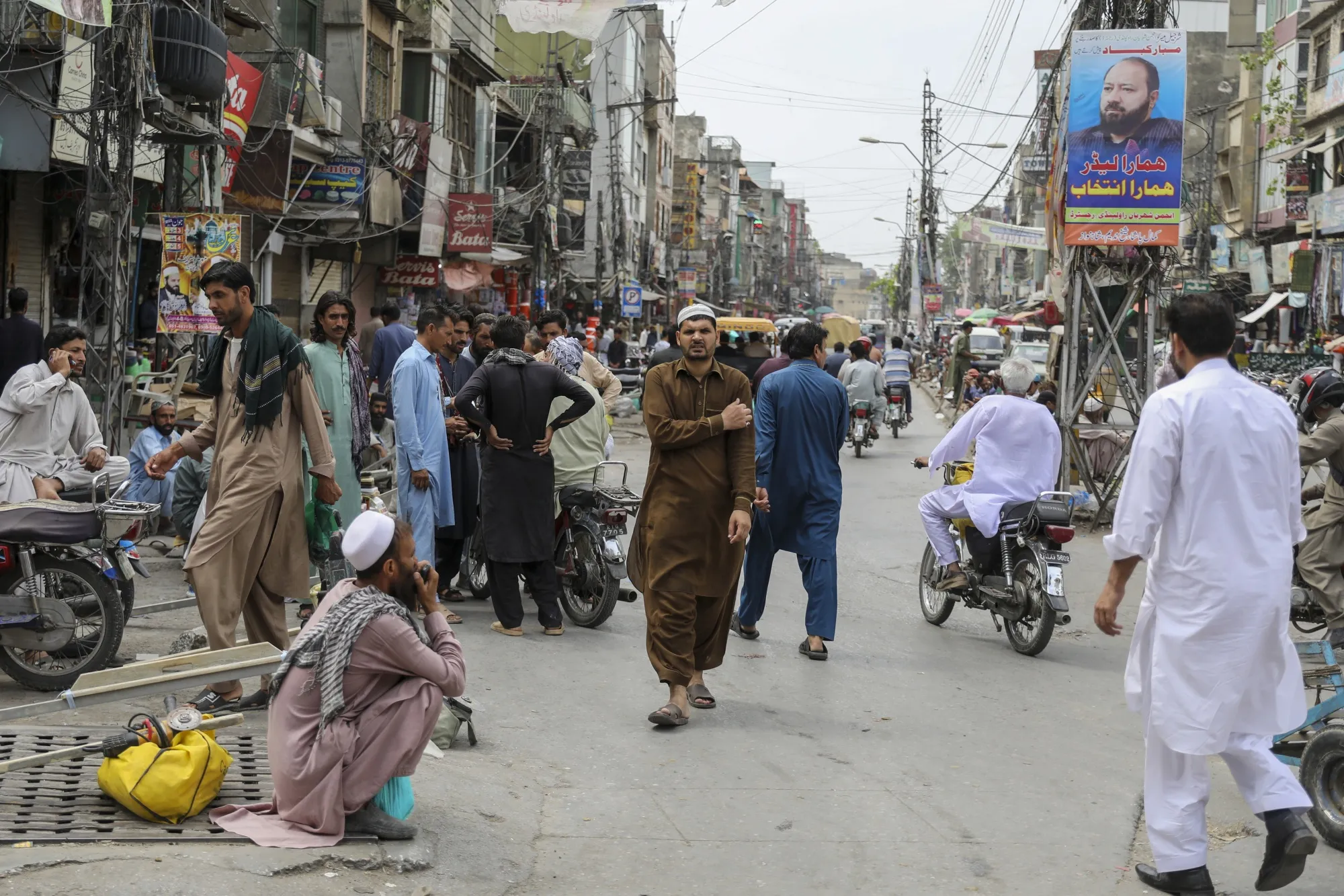Day laborers wait for work in Rawalpindi, Pakistan, on May 30.