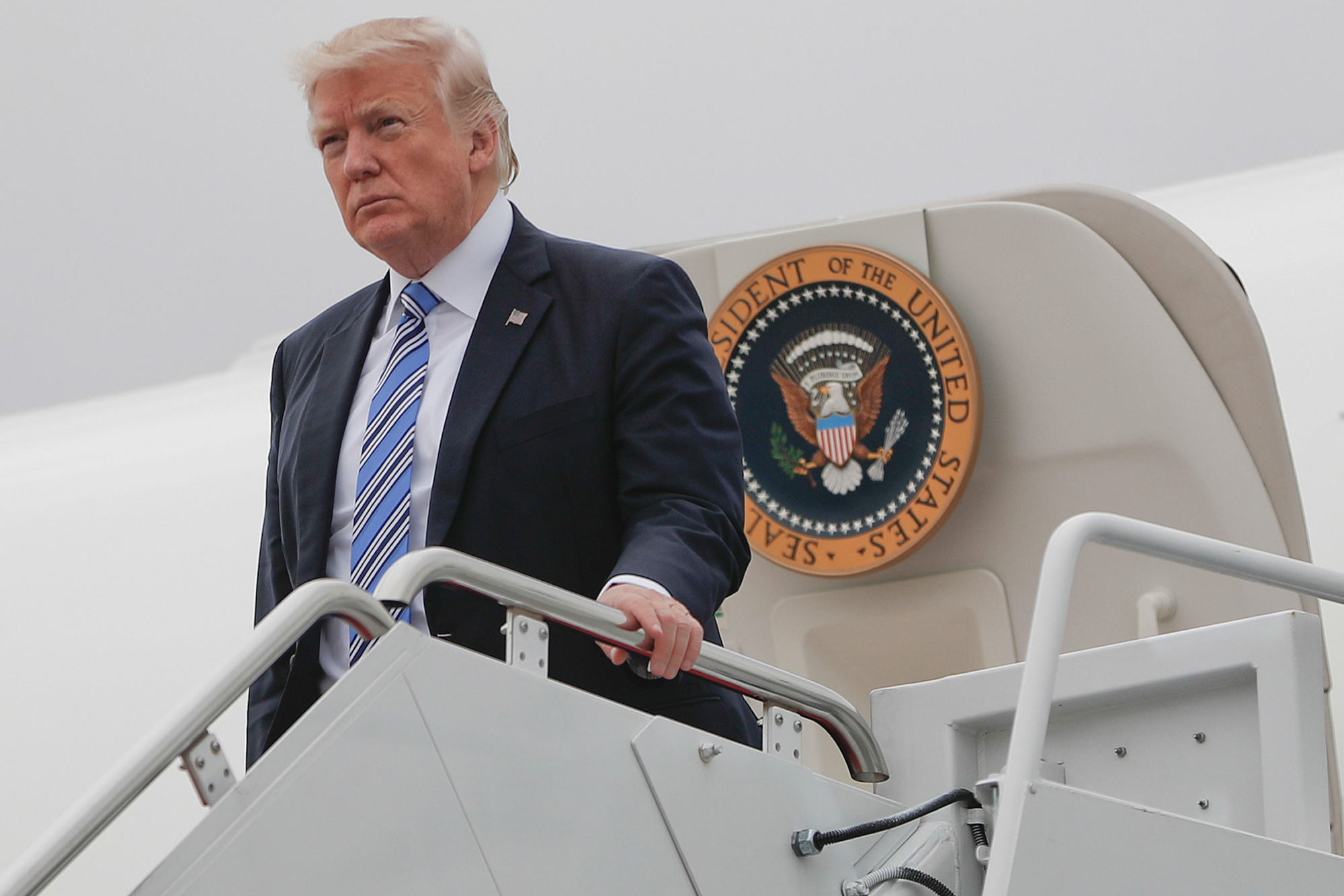 U.S. President Donald Trump walks down the stairs of Air Force One during his arrival at Andrews Air Force Base, Md., on May 13.
