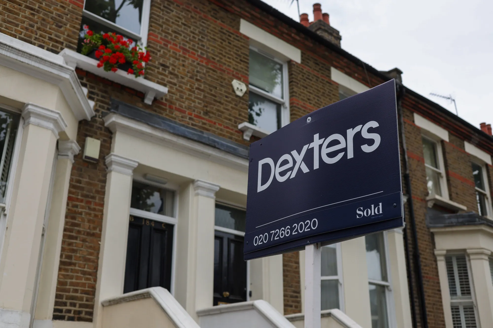 A Dexters London sign outside a residential property in London.