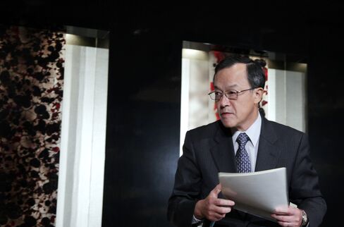 Olympus Urged to Extend Executive Purge