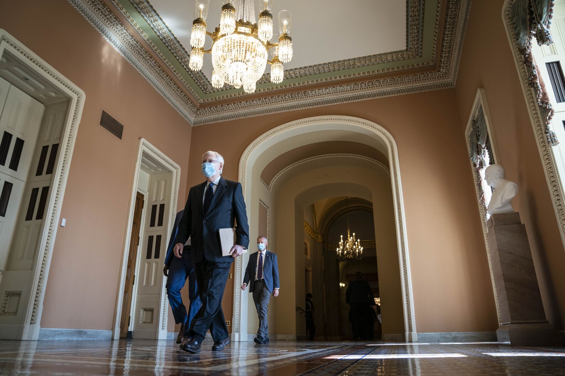 Mitch McConnell walks from his office to the Senate floor at the U.S. Capitol in Washington, D.C. on July 27.