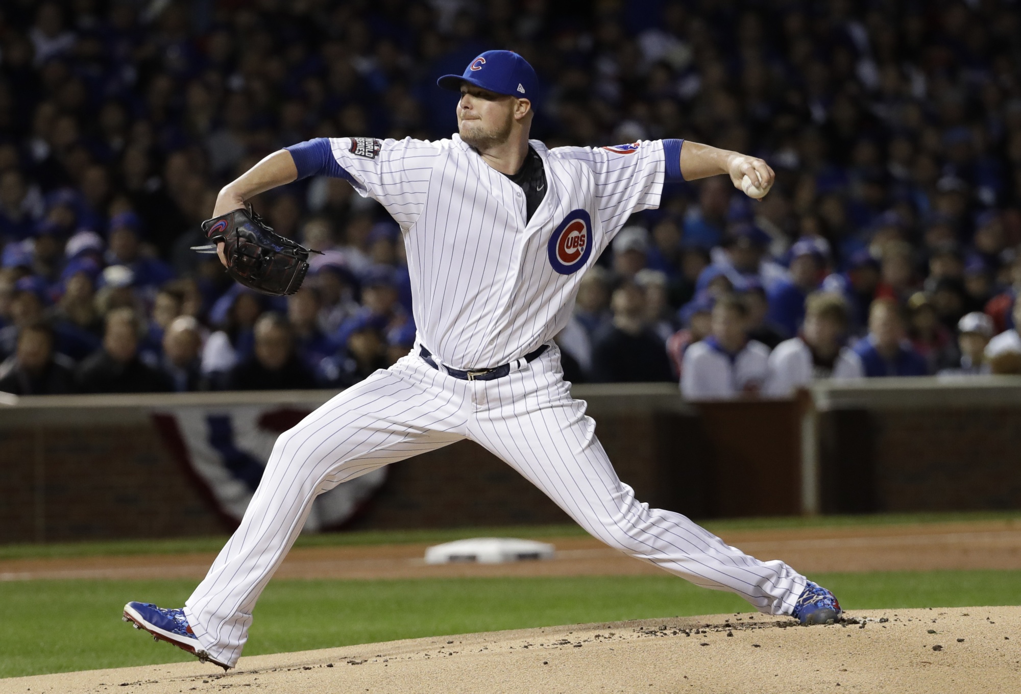Jon Lester of the Boston Red Sox delivers a pitch against the New News  Photo - Getty Images