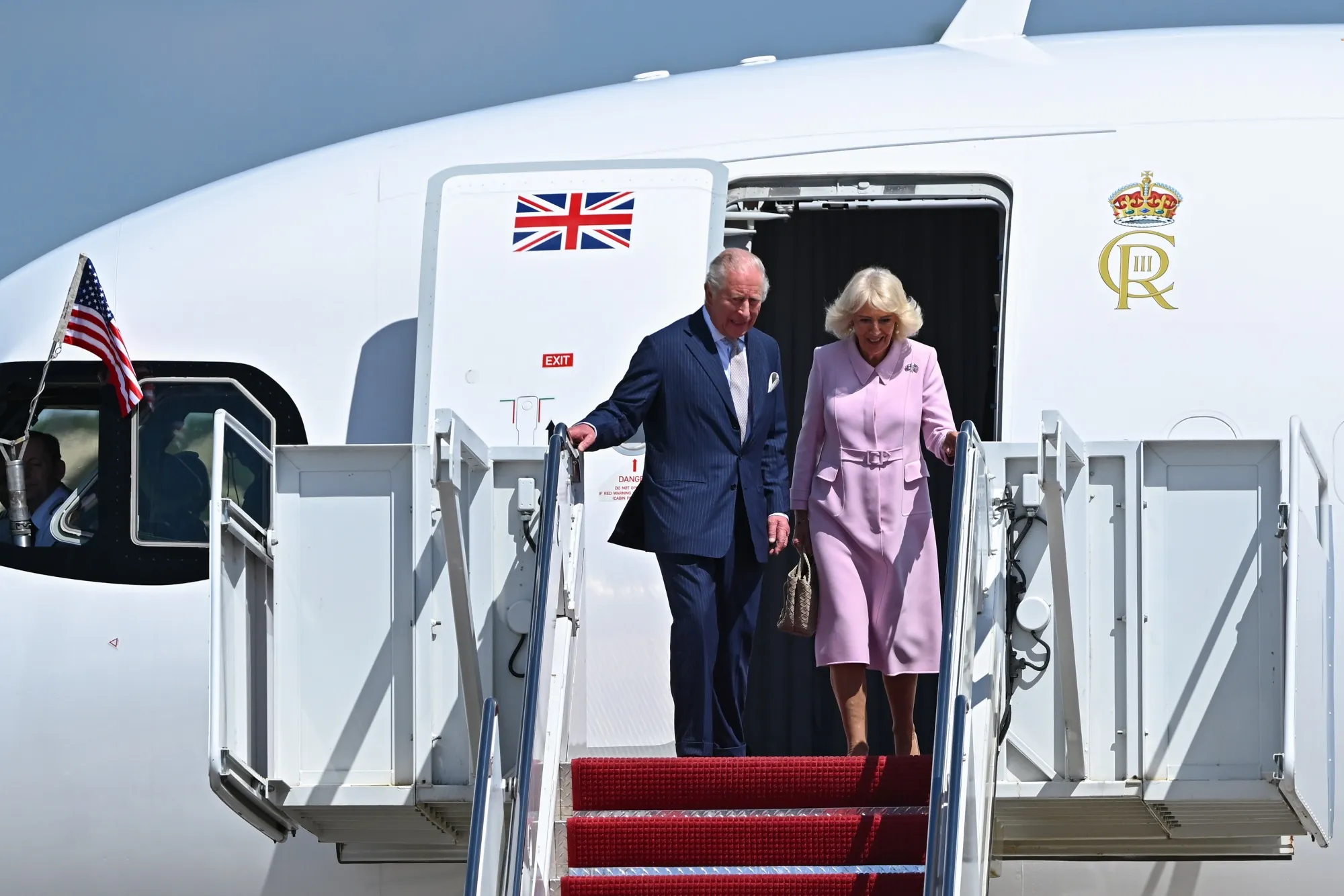 King Charles III and Queen Camilla disembark their plane upon arrival at Joint Base Andrews, Maryland, on April 27.&nbsp;