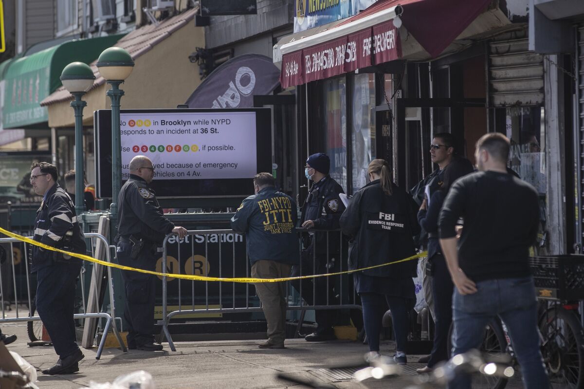 Law enforcement officers at the scene of a shooting at the 36th Street subway station in the Sunset Park neighborhood in the Brooklyn borough of New York, U.S., on Tuesday, April 12, 2022.