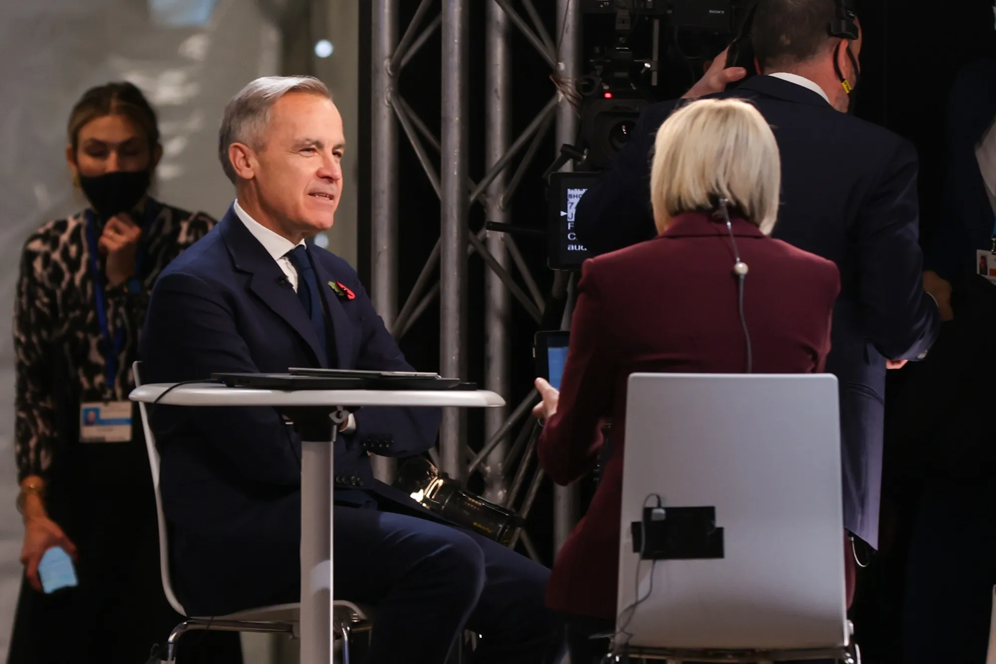 Mark Carney, left, at the COP26 climate talks in Glasgow, on Nov. 1.
