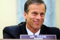 Senator John Thune, a Republican from South Dakota, smiles during a Senate Commerce, Science and Transportation Committee hearing on the nomination of Chicago billionaire Penny Pritzker for Commerce secretary in Washington, D.C., U.S., on Thursday, May 23, 2013.
