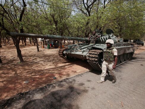 In this file photo, a Nigerian soldier mans a check point in Gwoza, Nigeria.