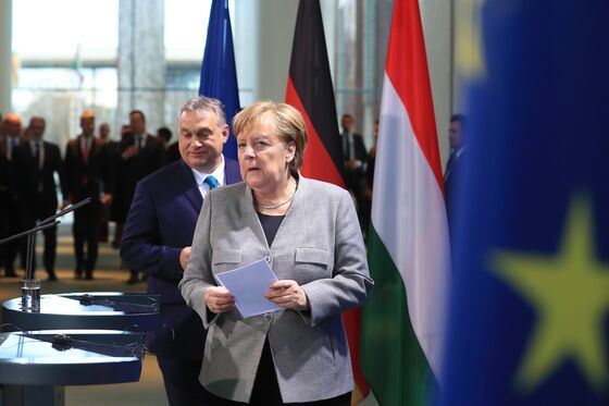 Europe’s East Risks Being Cut Adrift as Biden Comes, Merkel Goes