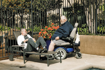 Donald Dale Foley (left) runs Triangle Square’s movie night; Philip Radtke offers a cab service for other tenants