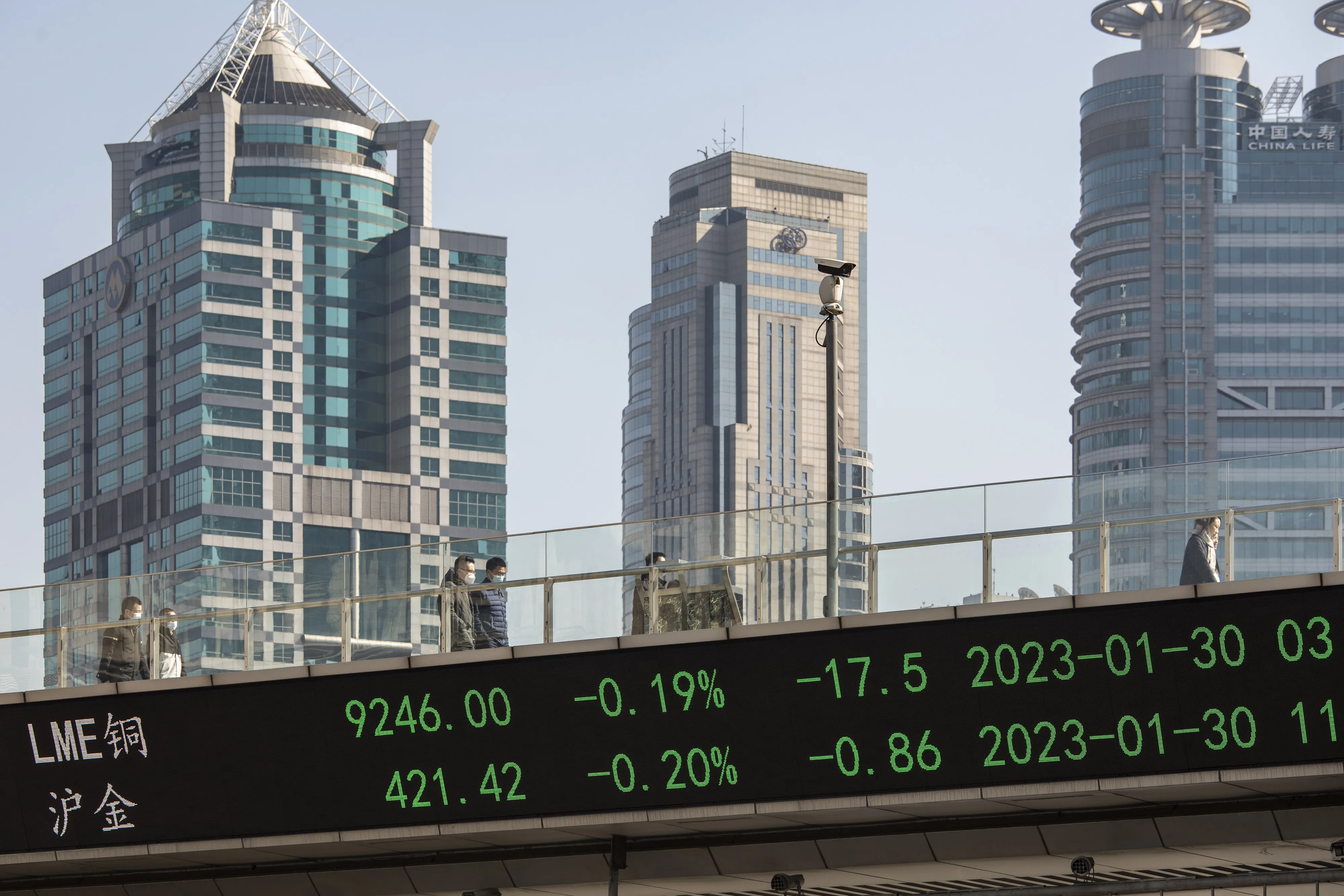 A stock ticker in Pudong's Lujiazui Financial District in Shanghai, China.