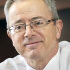 Headshot of John F Ippolito