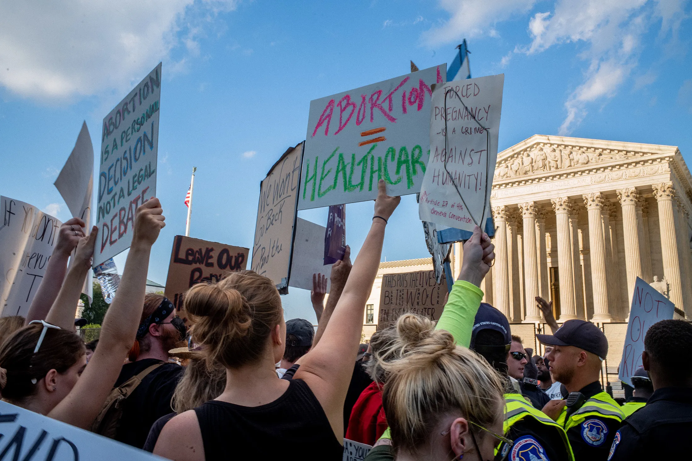 Abortion-rights demonstrators protest in front of the Supreme Court building in Washington, D.C., on June 25.
