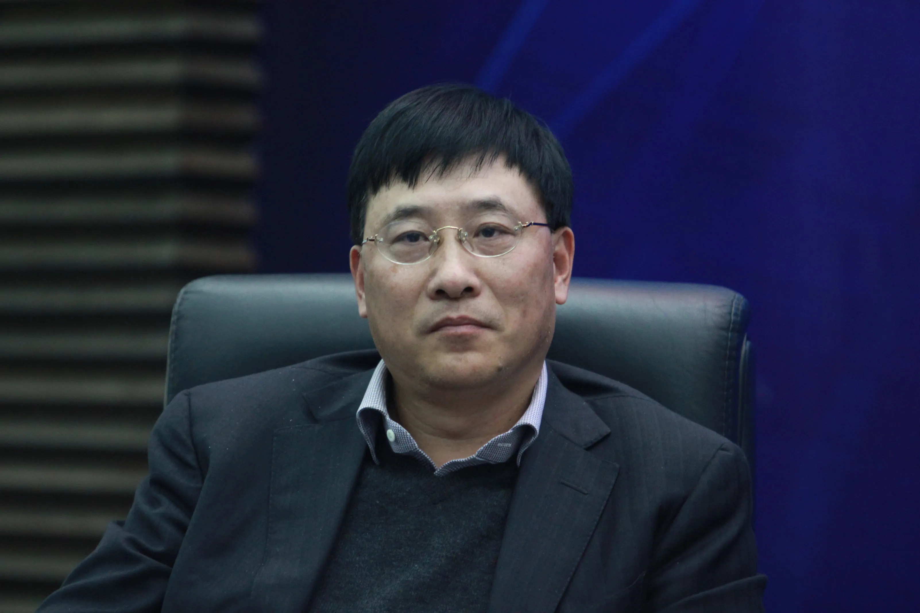 Nie Qingping, General Manager of China Securities Finance Corporation Ltd., at a seminar in Wuhan. Photographer: Imaginechina
