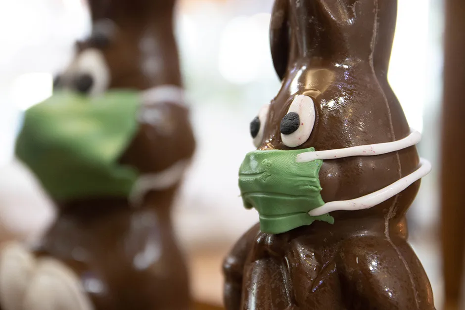 Easter chocolate bunnies with face masks sit in a patisserie in Thessaloniki, on April 7.