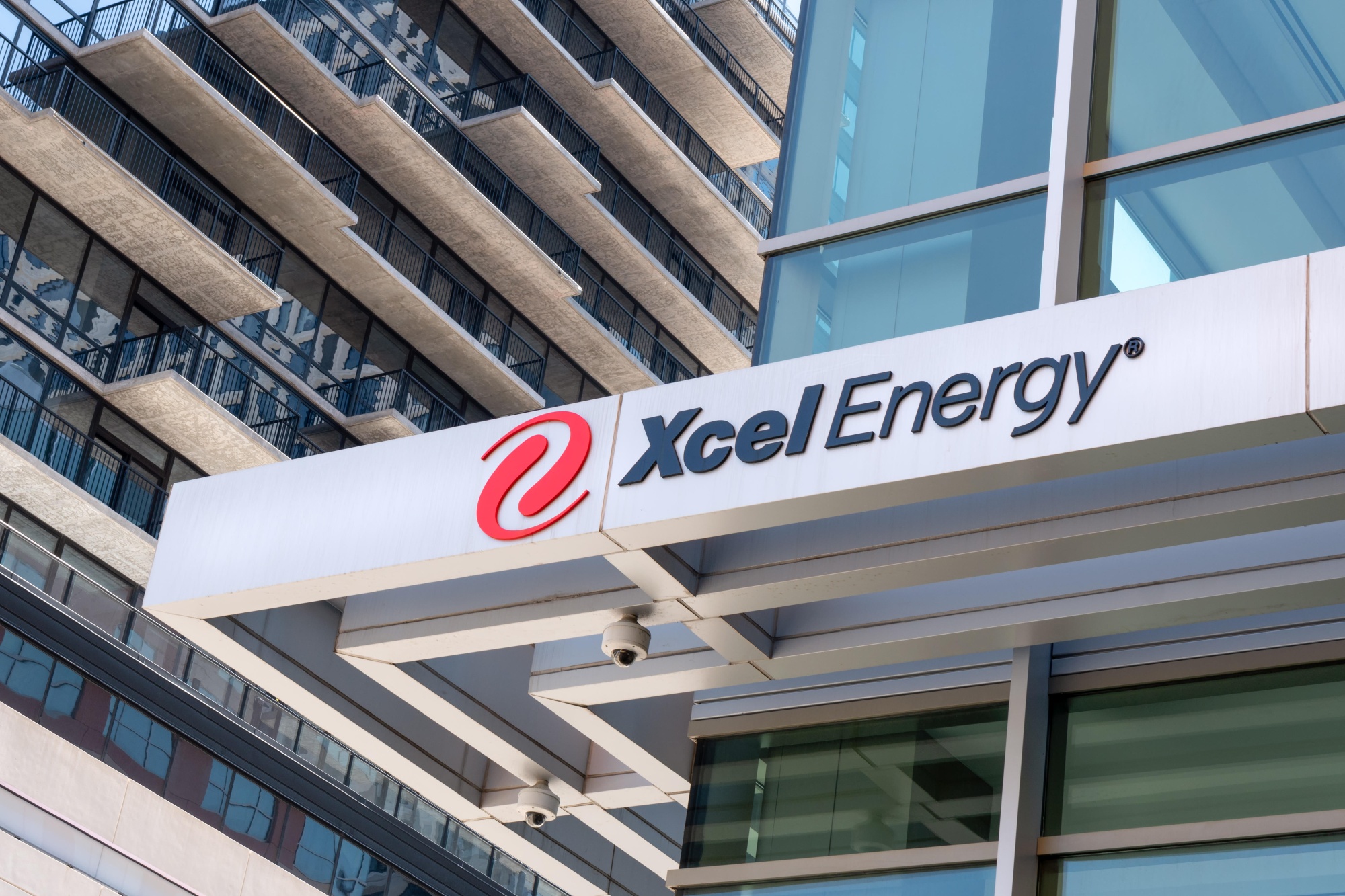 MINNEAPOLIS, MN/USA - JULY 7, 2018: Xcel Energy corporate headquarters exterior and trademark logo. Xcel Energy Inc. is a utility holding company.
