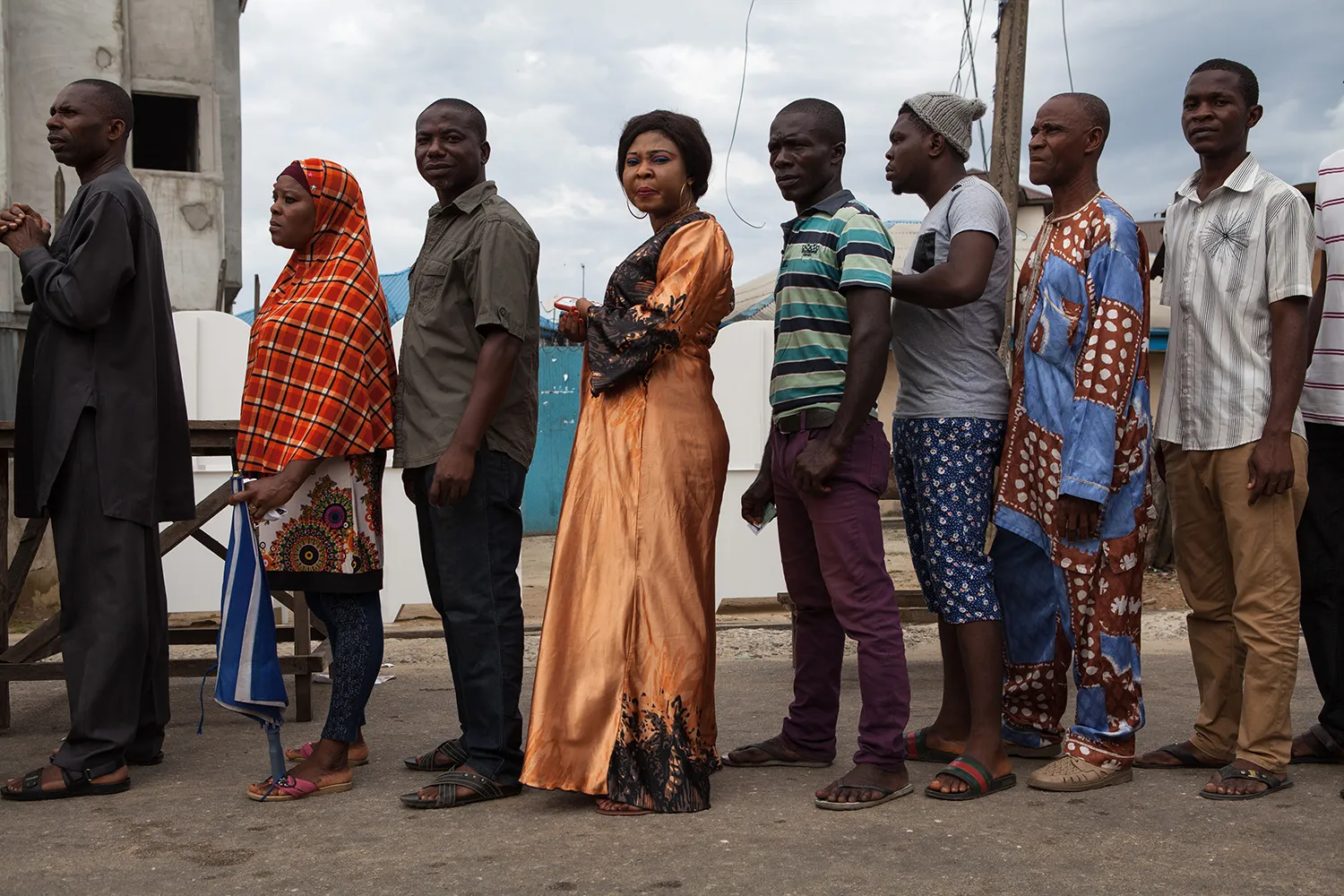People line up to vote at a polling station in Port Harcourt, Nigeria