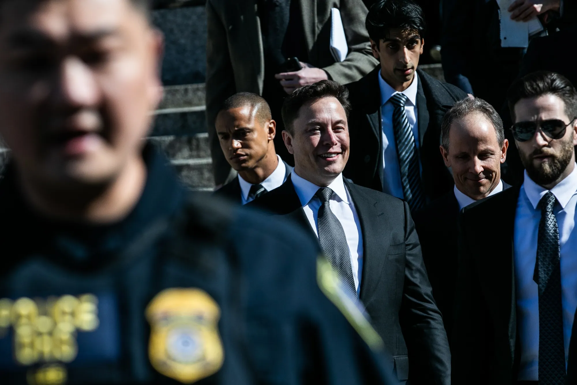 Elon Musk departs from federal court in New York on April 4.