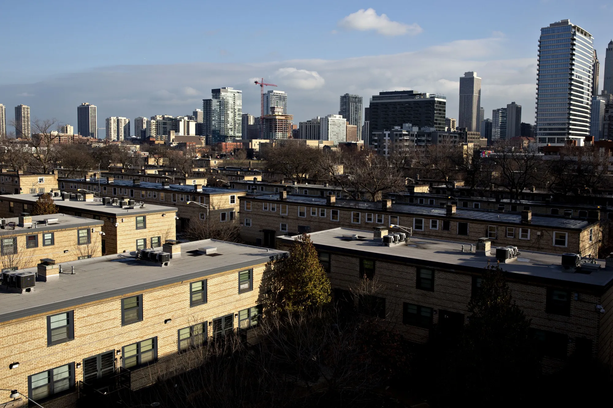 The Cabrini-Green rowhouses stand in front of highrise buildings in Chicago, Illinois.