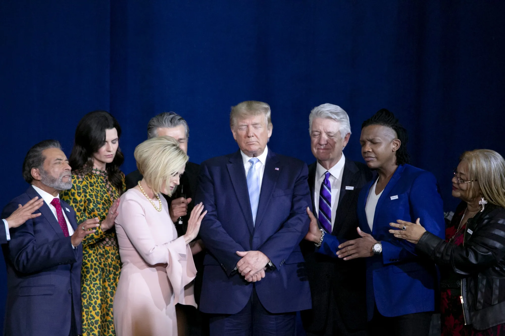 Donald Trump&nbsp;prays during an 'Evangelicals for Trump' Coalition launch event in Miami, Florida, on Jan. 3.