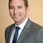 Headshot of Mark J Austin